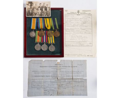 A WWI group of three to ' 2056 Pte H Grant Devon R' :, War Medal Territorial Force Medal and Victory Medal, framed together w