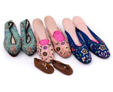 A pair of vintage lady's Chinese blue silk shoes:, and a similar pink silk pair of shoes , both with floral embroidery and le
