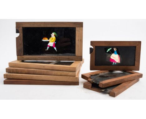 A group of eight hand-painted magic lantern slipping slides:, including 'The Butcher's Dream' 'peacock' and others (8)