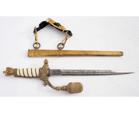 A Third Reich Period Kriegsmarine Dirk by F W Holler, Solingen:, the straight double edge fullered blade with acid etched scr