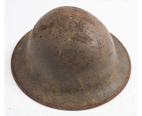 A WWI period British Brodie pattern helmet:.