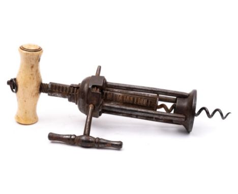 A bone handled London type rack and pinion corkscrew, with open four bar body.: 