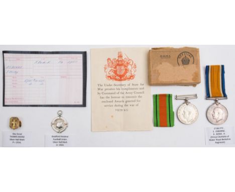 A WWI War Medal to '37380 Pte S Osbourne R Berks R':, together with a Bradford Amateur football silver medal, a silver Scouts