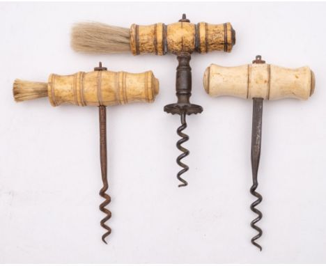 A Henshaw type corkscrew:, with ring turned bone handle with brush, turned shaft with fluted button over wire helix, together
