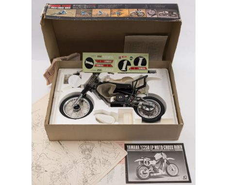 Kyosho (Japan). A  1/45th scale motor Yamaha YZ250 EP Motocross Rider remote control kit:, in original box with instructions 