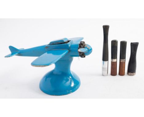 An Art Deco aeroplane petrol table lighter: probably by Hamilton (USA), in a blue colour with black radial engine ( damaged),