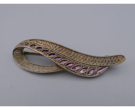 An Art Deco THEODOR FAHRNER (1859-1919) 925 silver and enamel brooch. 5.5 cm wide.