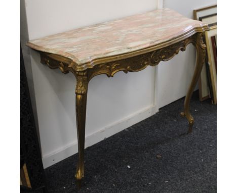 A gilt decorated marble topped console table, with associated marble. The base 101 cm wide.