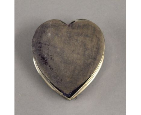 A silver heart shaped trinket box. 8.5 cm wide. 2.7 troy ounces total weight.