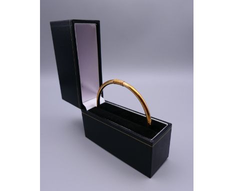 A Cornish 9 ct gold bangle. 7 cm diameter. 6.72 grammes