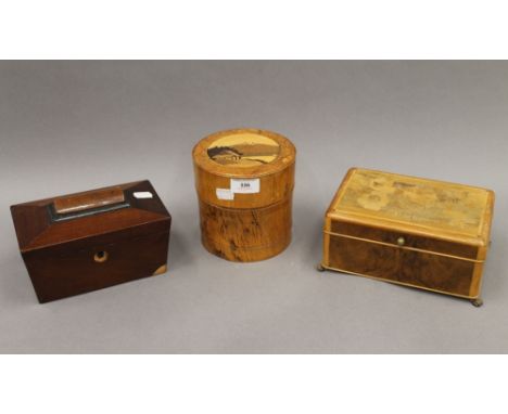 A Victorian mahogany tea caddy and two inlaid boxes. The former 19.5 cm wide.