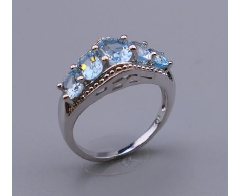 A silver dress ring. Ring size O/P.