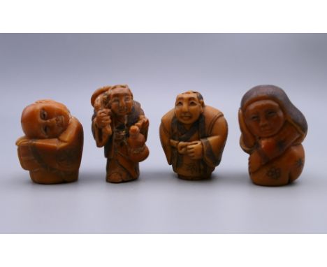 Four bone netsuke. The largest 3.5 cm high.