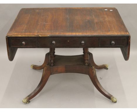 A 19th century rosewood sofa table. 