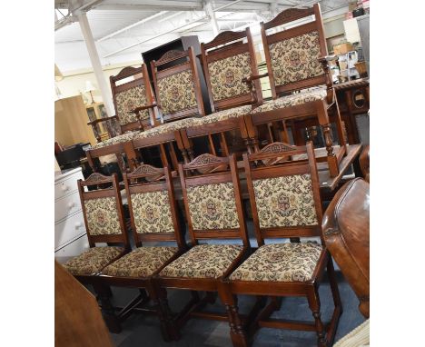 A Set of Eight Old Charm Tapestry Upholstered Oak Framed Dining Chairs to Include Two Carvers 