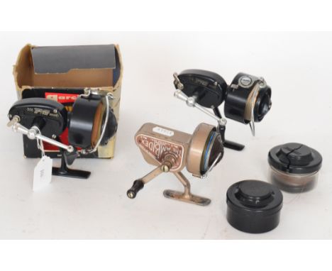 Two Mitchell 300 Garcia spinning reels with two spare spools and an Ambidex No1 casting reel (3)