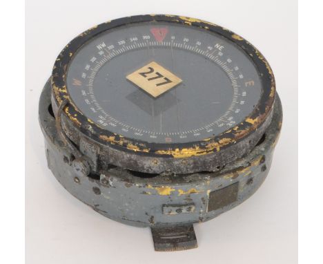 A World War Two naval circular compass type P4A serial number 10932 T grey painted case, diameter 16.5cm.