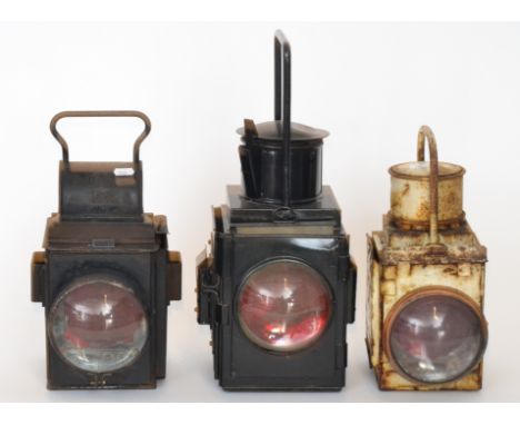 Railway - A BR black painted double bulls eye break van side lamp and two BR tail lamps one marked (Sc) (3)