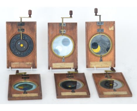 Nine 19th Century hand cranked mahogany framed mechanical astronomical magic lantern slides depicting the solar system and th