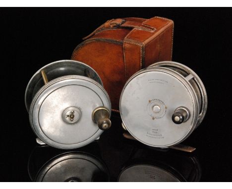 A Hardy fly fishing reel 'The Perfect' size 4 1/4in in a brown leather case with button flap, together with a similar fly ree