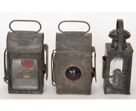 Railway - Two bulls eye station hand lamps by Chapman Bros 1938 and 1939 Birmingham, height 22cm and a small hand lamp marked