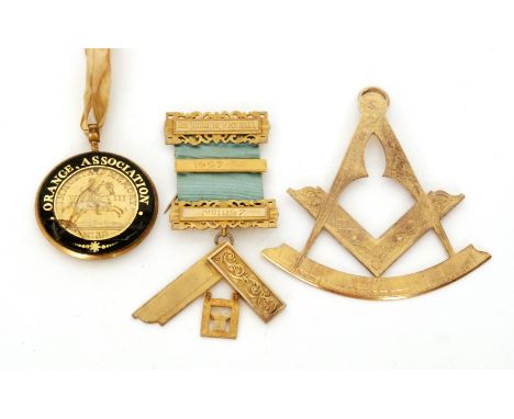 A silver gilt Masonic pendant in the form of a square and compass engraved presented to the right Wor master C.J Harper by th