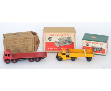 Dinky Supertoys - Blaw Knox Bulldozer No 561 together with a dumper truck No 562, boxed, a red and black Foden lorry with rai