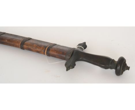 A 19th Century Middle Eastern scimitar sword and banded wooden scabbard, length 85cm