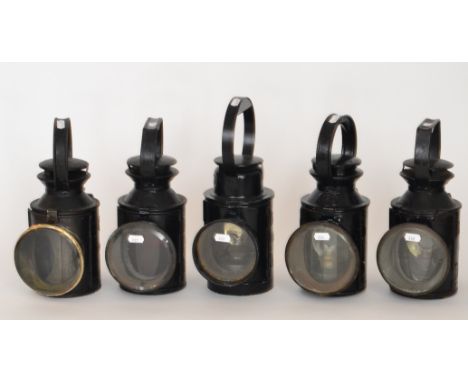 Railway - A near pair of BR black painted hand lamps one marked (M), a LMS hand lamp No32303, another No 28646 and a LMS lamp