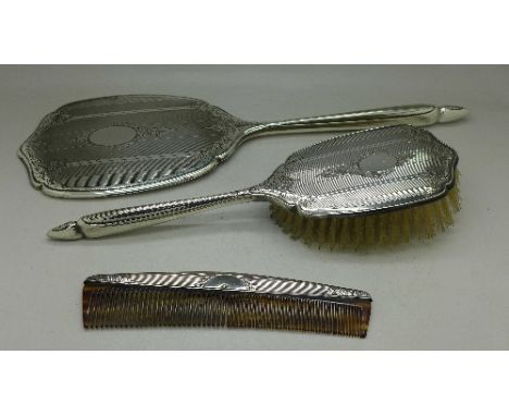 A silver mirror, brush and comb, Birmingham 1954