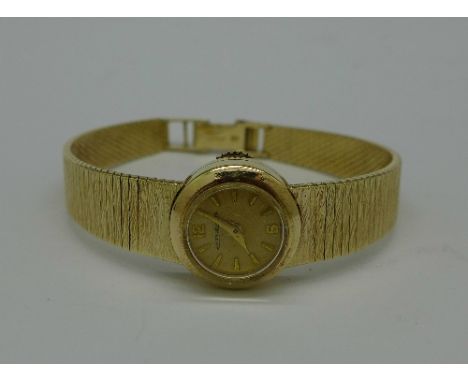 A lady's 9ct gold Jaeger LeCoultre wristwatch, total weight 22.5g