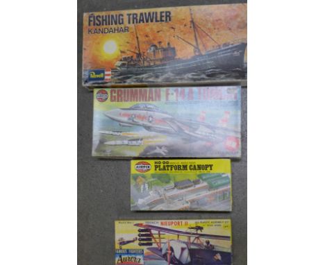 Four plastic model kits including Airfix, Revell and Aurora