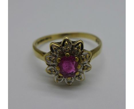 A 9ct gold, ruby and diamond cluster ring, 2.1g, P