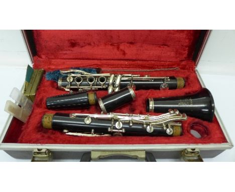 A cased clarinet, Boosey & Hawkes, with purchase order dated 1974