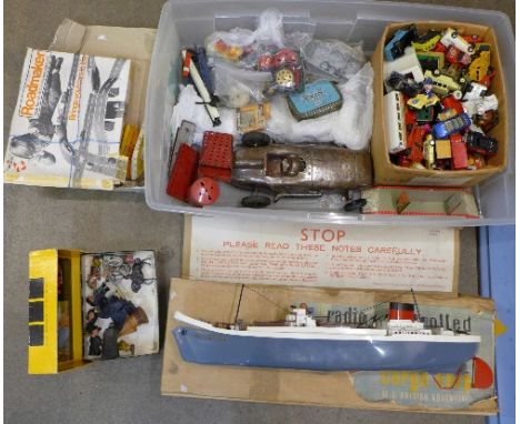 Die-cast model vehicles, a Tri-ang cargo ship, Meccano, etc.