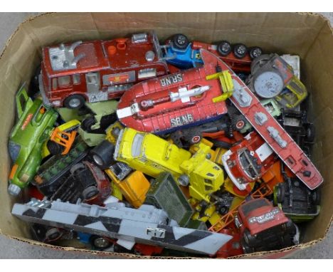 A collection of die-cast model vehicles including Dinky and Corgi, playworn
