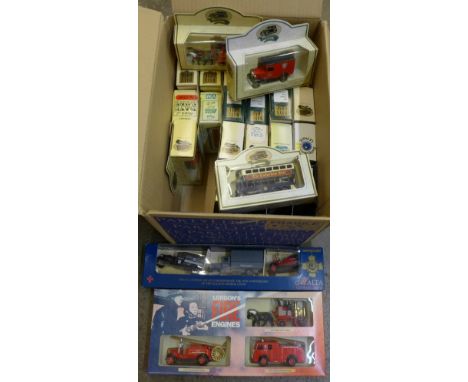 Twenty-six boxed model vehicles including Lledo London's Fire Engine set