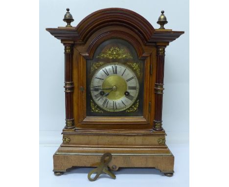A walnut cased bracket clock, with paper label marked H.A.C. 14 Day Strike, made in Wurttemberg