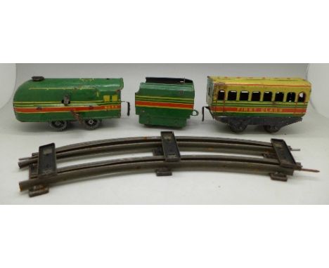 A Brimtoy tin-plate clockwork train with track