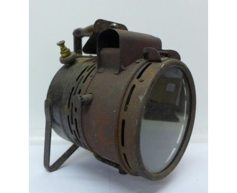 A spot light, the glass marked Tilley-Hendon
