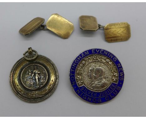 A silver athletic fob, a silver and enamel Nottingham Evening News 1937 Silver Jubilee badge and a pair of 9ct gold on silver