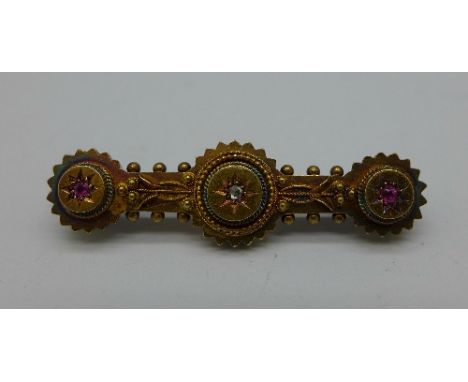 A 15ct gold, diamond and ruby brooch, 3.6g