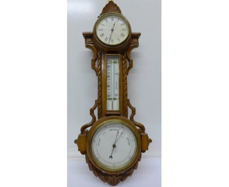 An oak cased clock barometer