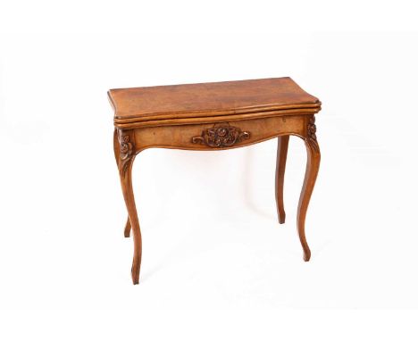 A Victorian beech and burr walnut veneered fold out card table with drawer action legs, the fold-over serpentine top opening 