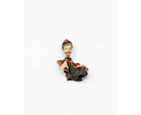 A mid 19th Century Italian puppet with carved bearded and moustached head and carved hands, the original material body with b