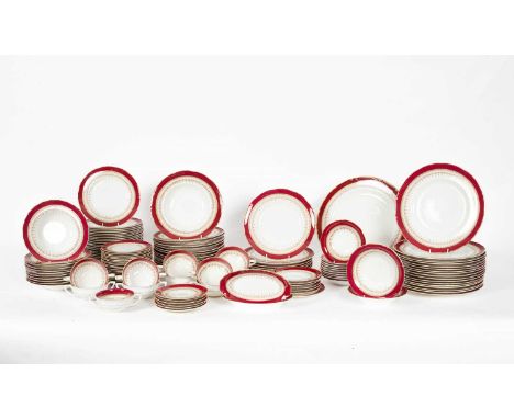 A Royal Worcester Regency pattern dinner service, claret rims with sepia printed pendant border, comprising: ten two-handled 