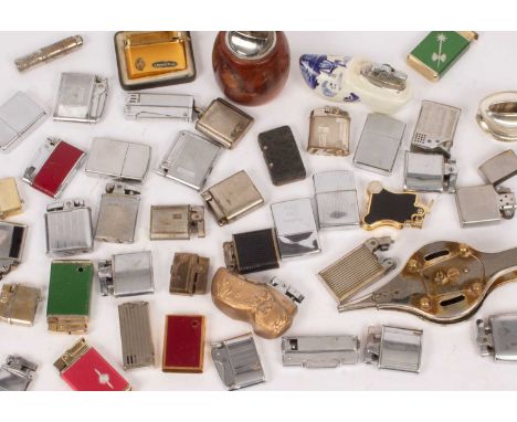 A collection of petrol lighters, Zippo, Fork, MW, KW, Ronson Banjo, Musical