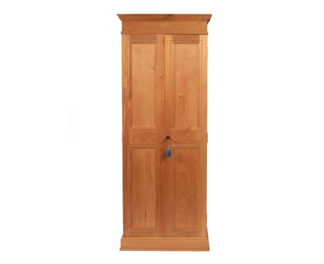 A tall cedar and chevron inlaid humidor cabinet, the interior with adjustable shelves and door interiors panelled with cigar 