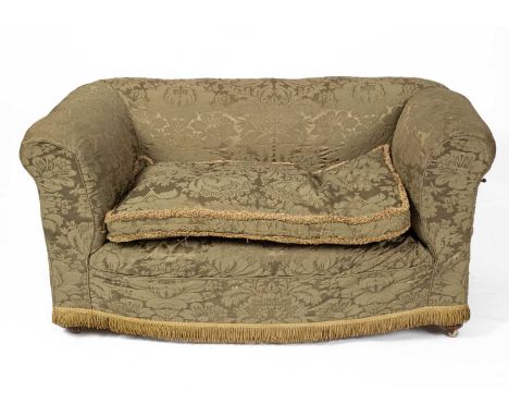 A child's Edwardian sofa with one lever-operated drop-end, on turned front feet with castors, 138cm wide, 74cm deep, 68cm hig