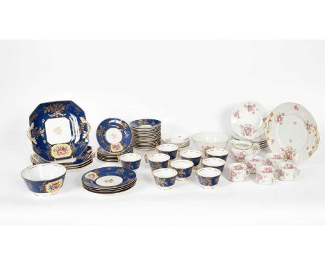 A Copeland Spode part tea set circa 1900, decorated with floral panels and in gilt to a powder-blue ground and a Limoges part